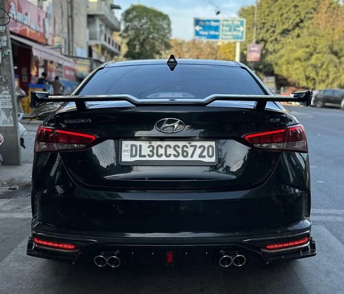 Universal Sedan Godzilla Spoiler