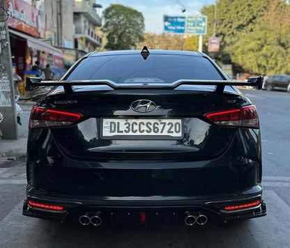 Universal Sedan Godzilla Spoiler